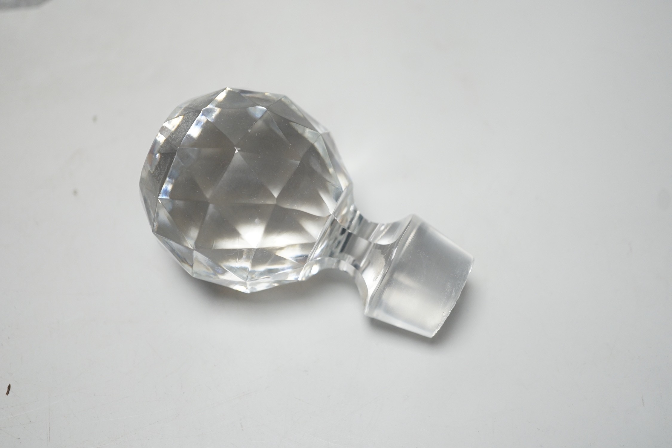 A pair of Victorian cut glass decanters and stoppers and one other, tallest 26cm